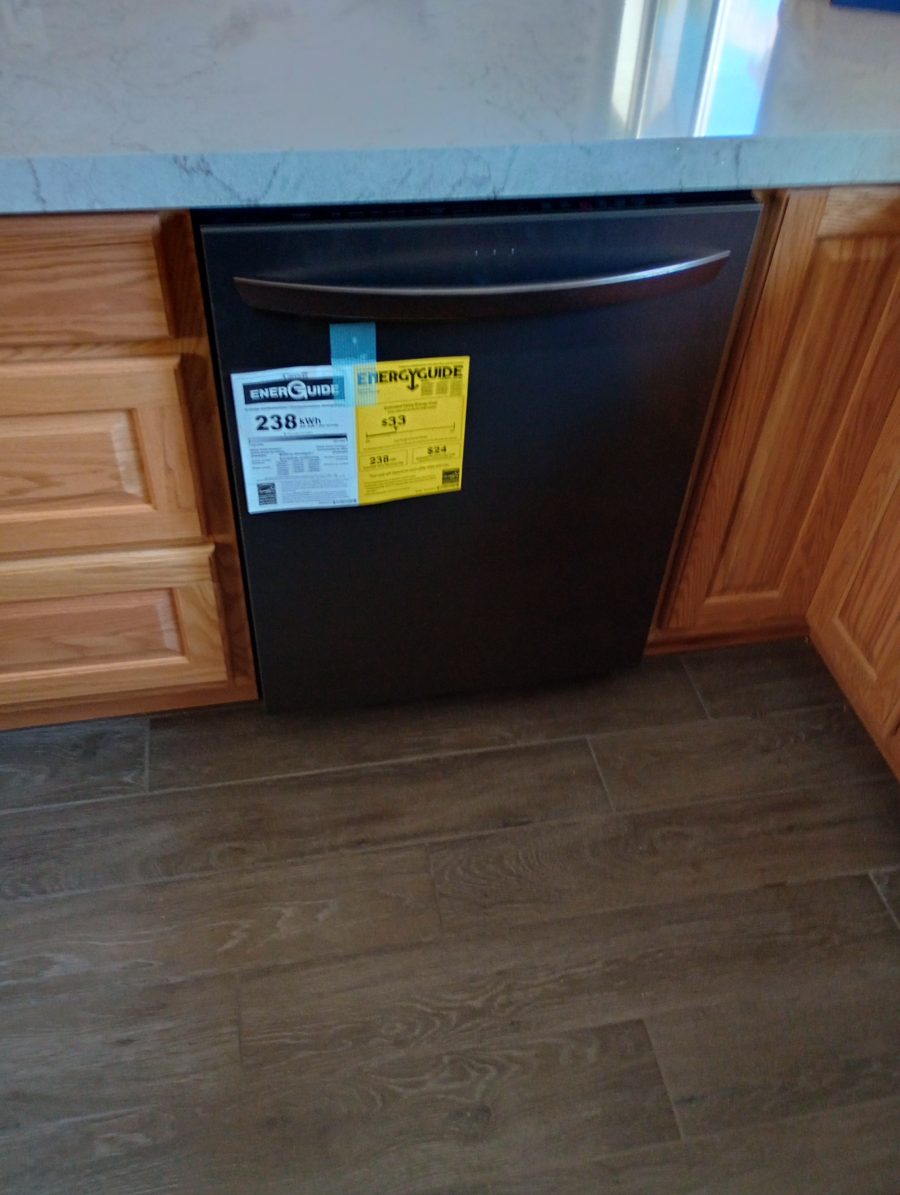 Dishwasher installed flush beneath the counter